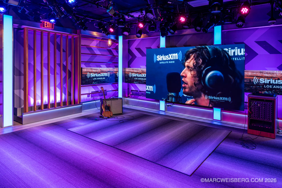 Performance studio with purple lighting and video wall at SiriusXM headquarters in Los Angeles