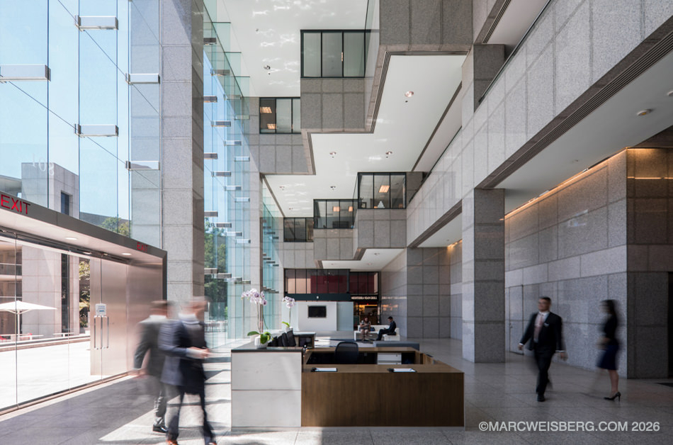 Multi story lobby atrium with reception desk at the New York Life Building in Glendale