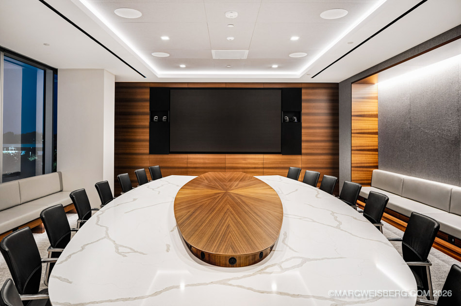 Conference room with marble table and wood paneling at Edwards Lifesciences in Irvine, California